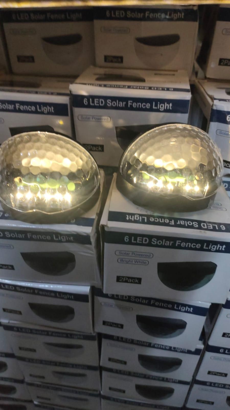 GlowGuard™ Solar Fence Lights – Pack of 4